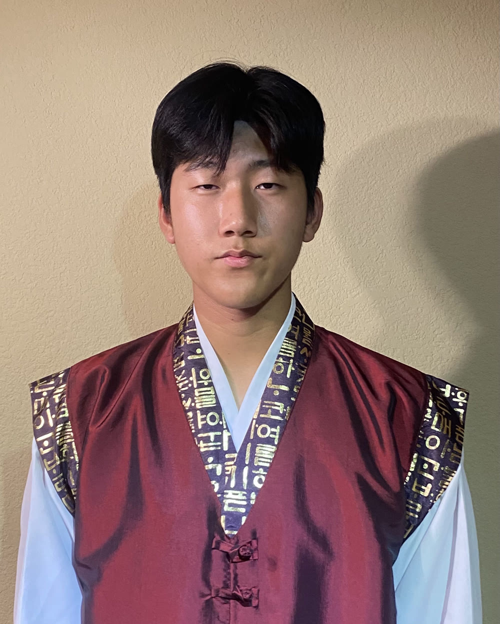 Hanyool Lee wearing a traditional Korean performance uniform